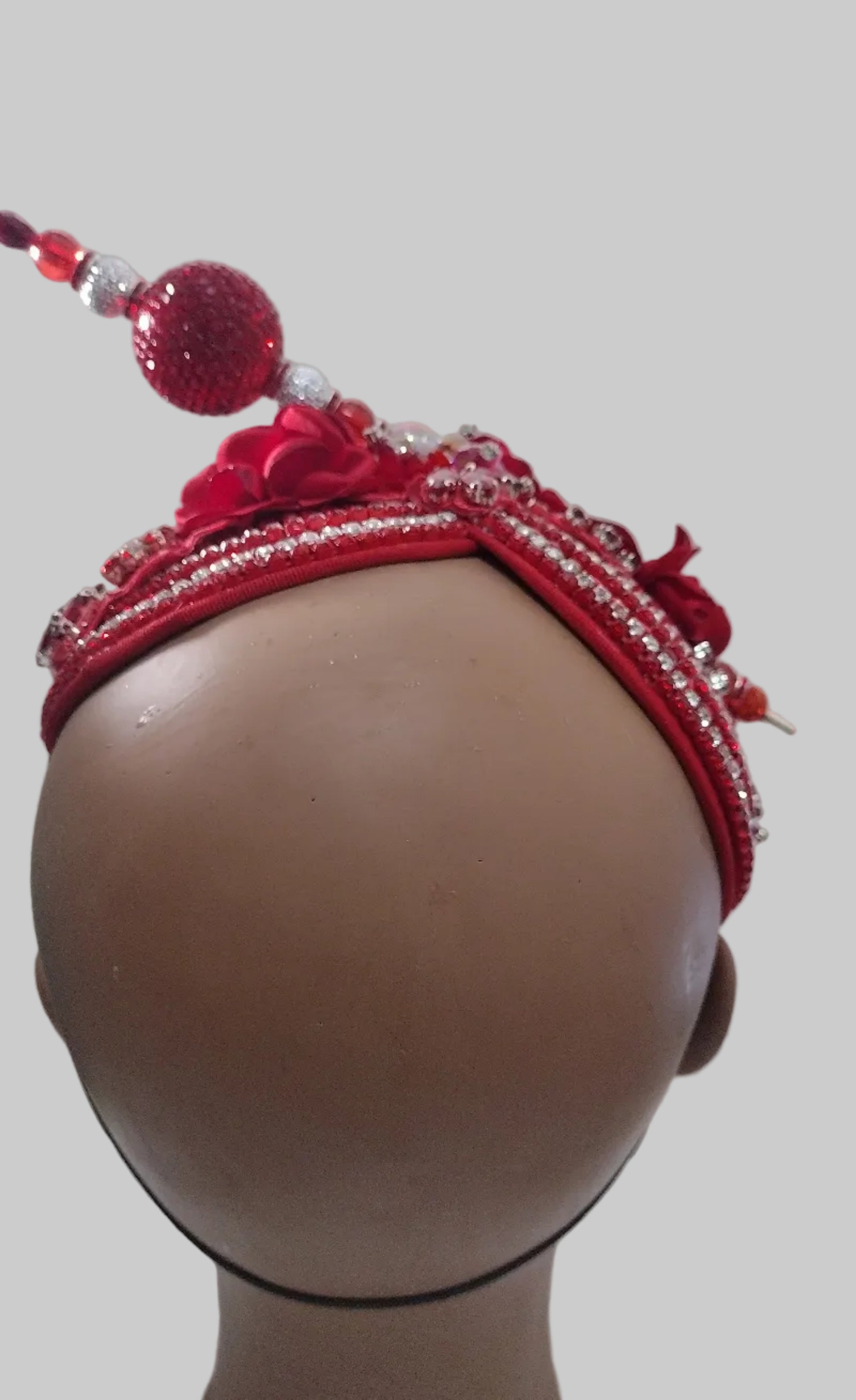 Red handcrafted church hat fascinator with floral and rhinestone details, featuring a stylish and elegant design by Roni Accessories Store.