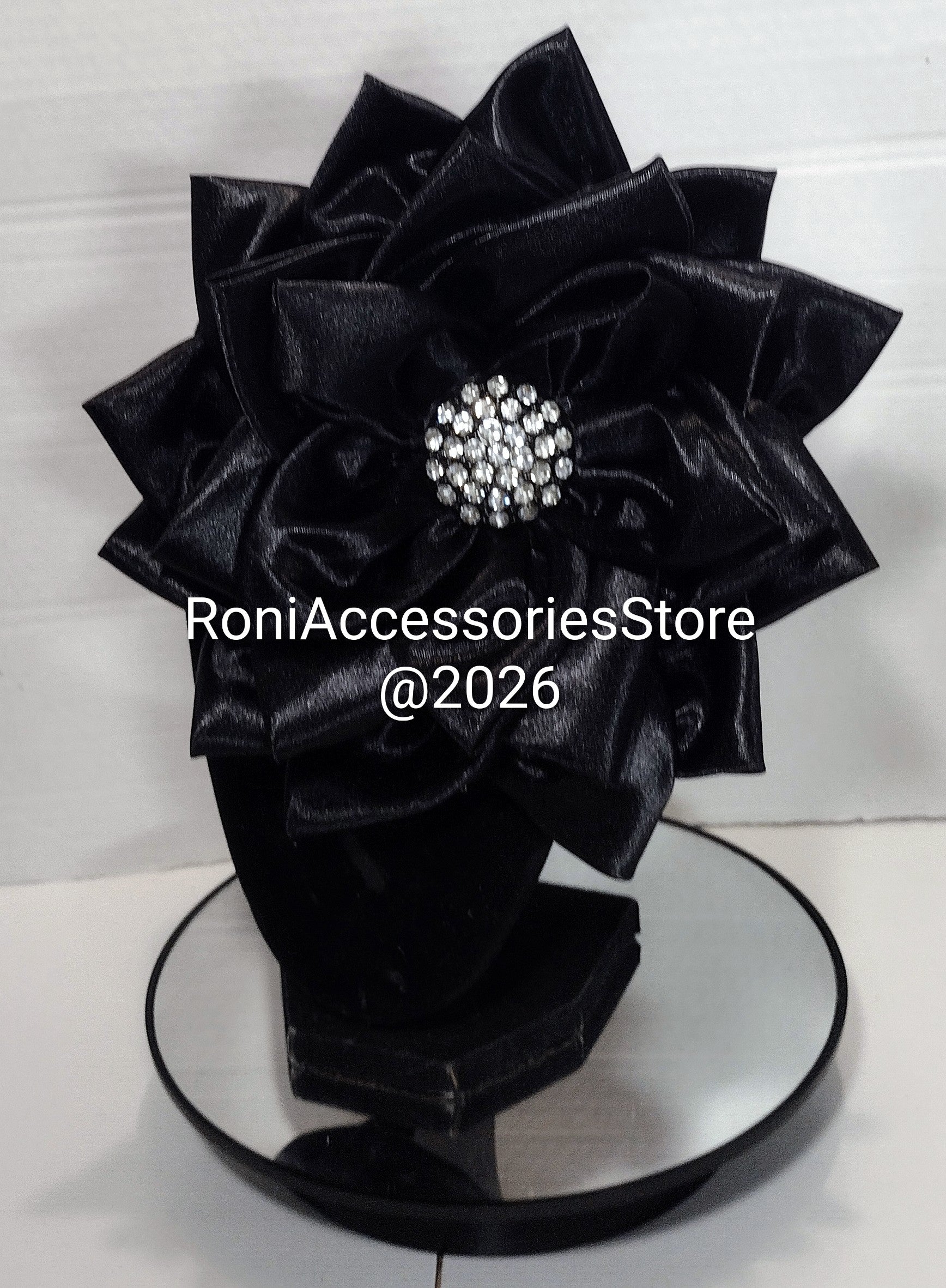 Black satin floral corsage pin with a decorative lapel flower designed for formal accessories by Roni Accessories Store