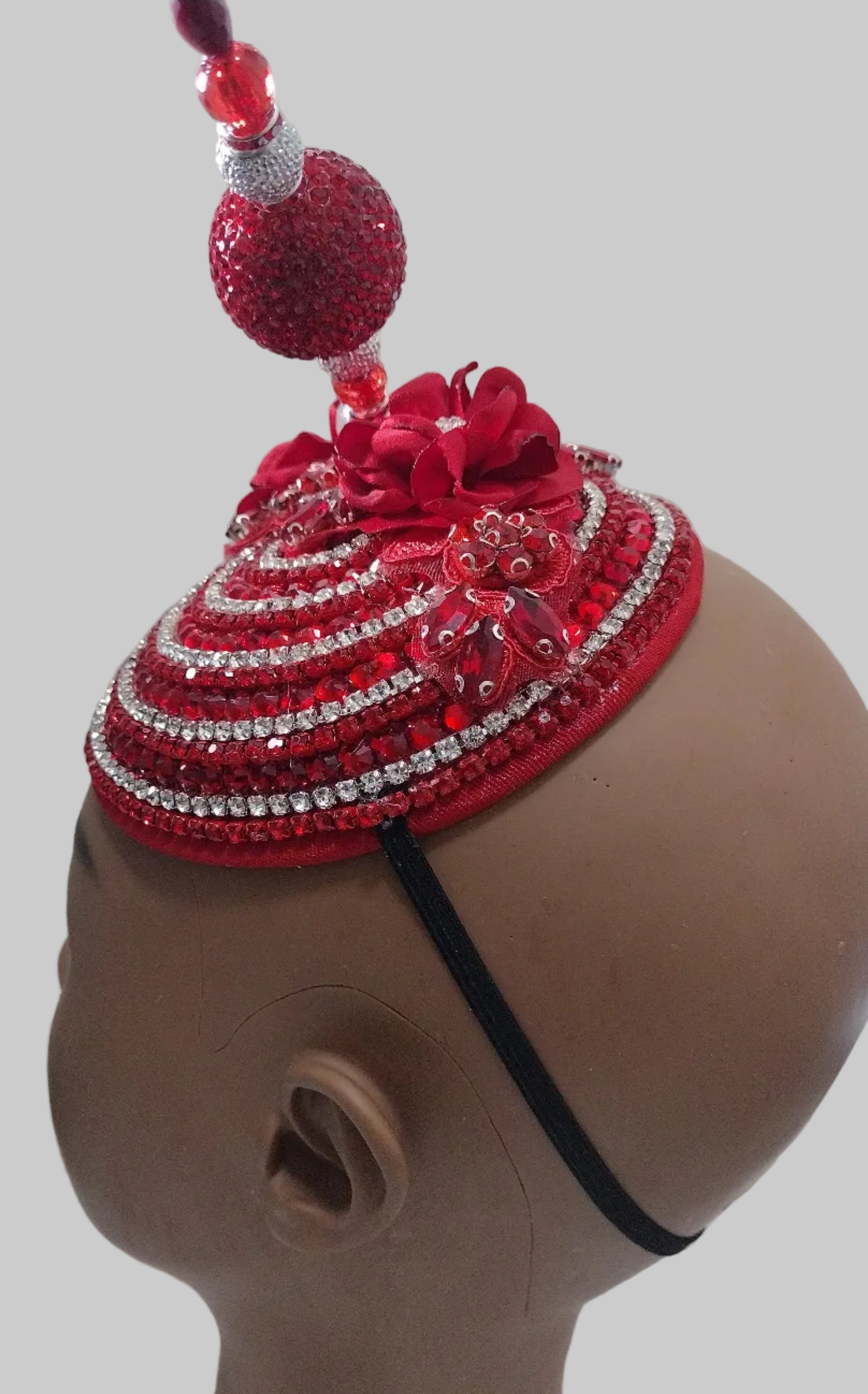 Red handcrafted church hat fascinator with floral and rhinestone details, stylish headpiece from Roni Accessories Store.