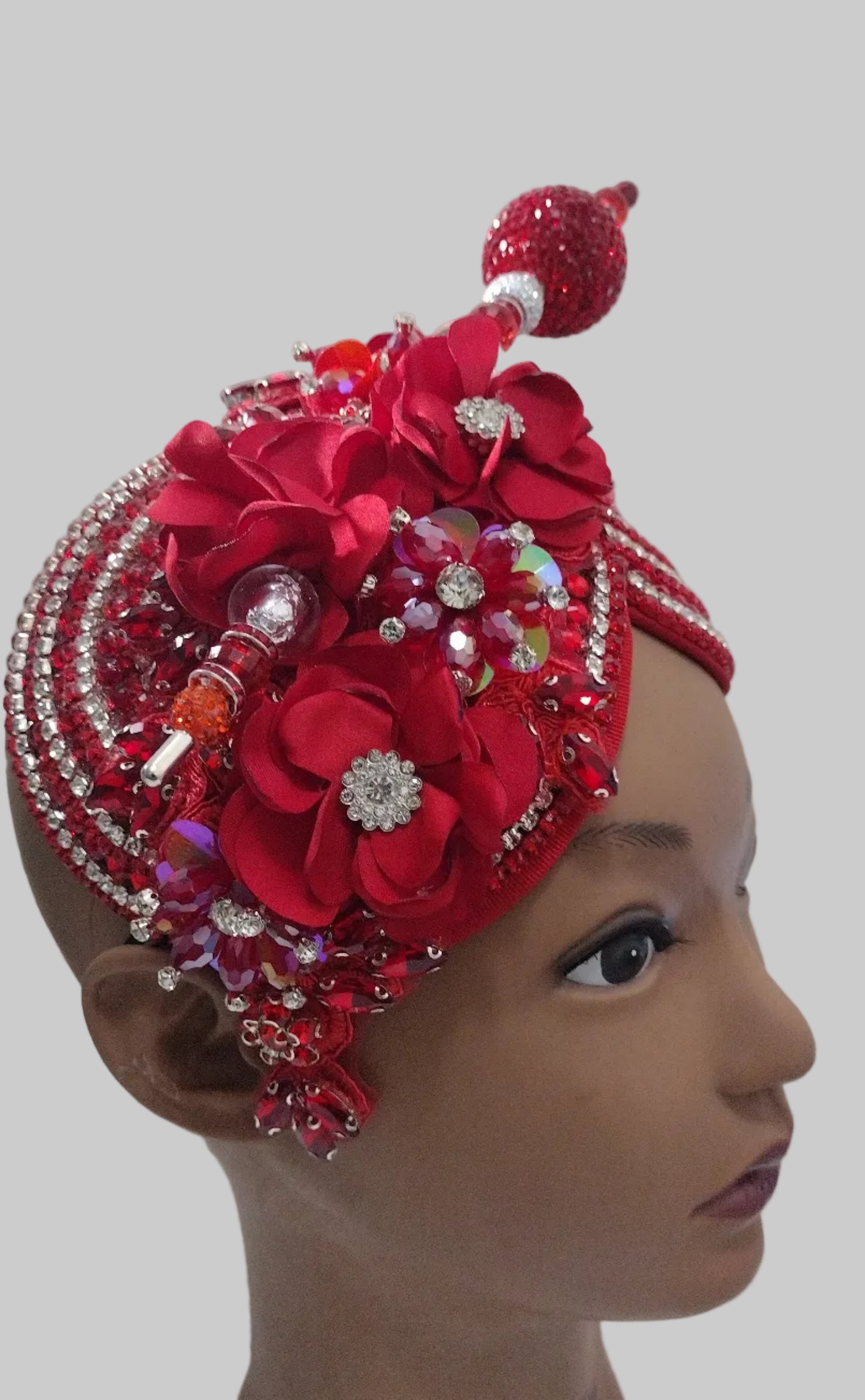 Red handcrafted church hat fascinator with floral and rhinestone details, perfect for special occasions and formal events.