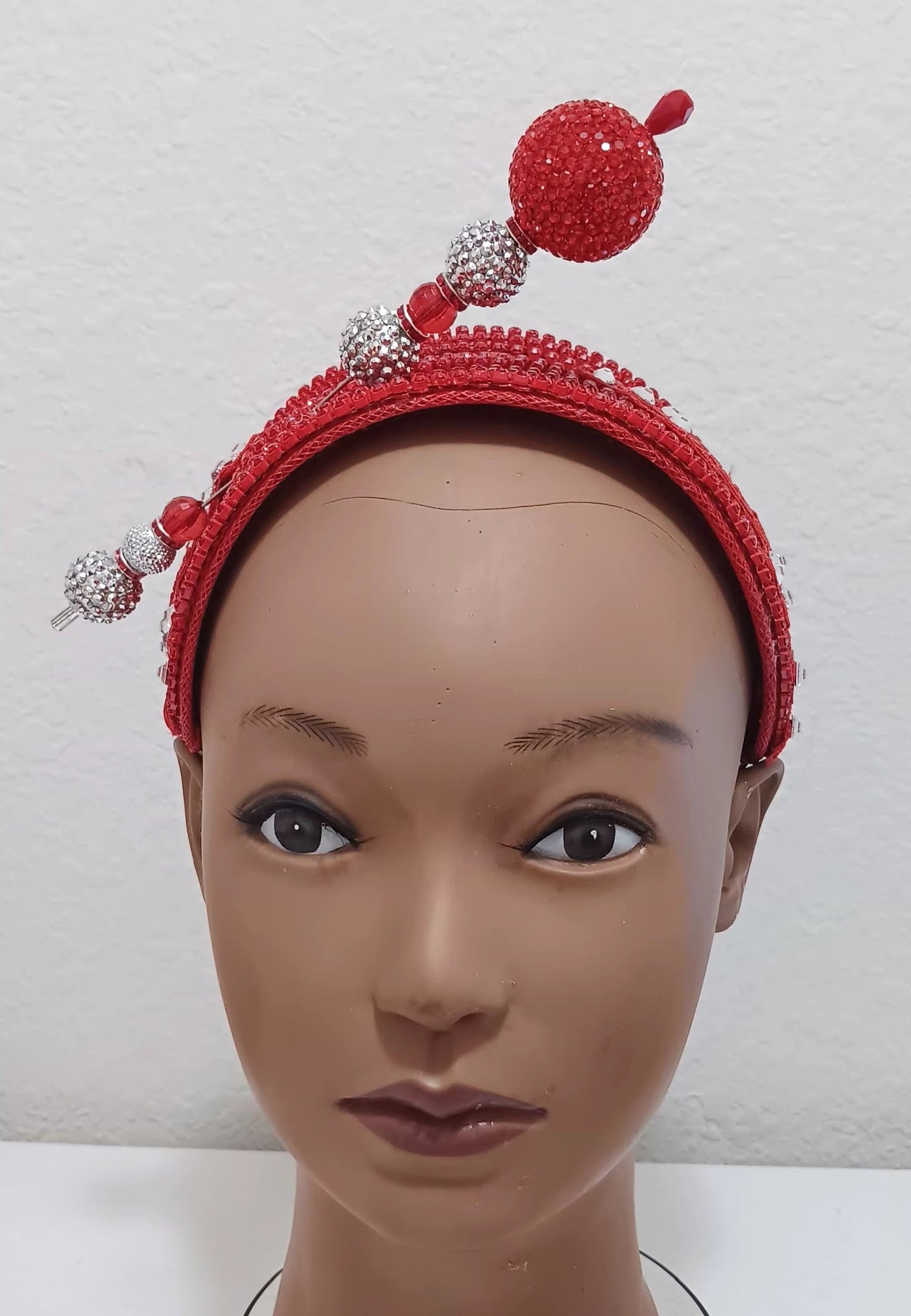 Red hat fascinator headband with hat pin, stylish church hat accessory by Roni Accessories Shop, featuring elegant design and bold color.