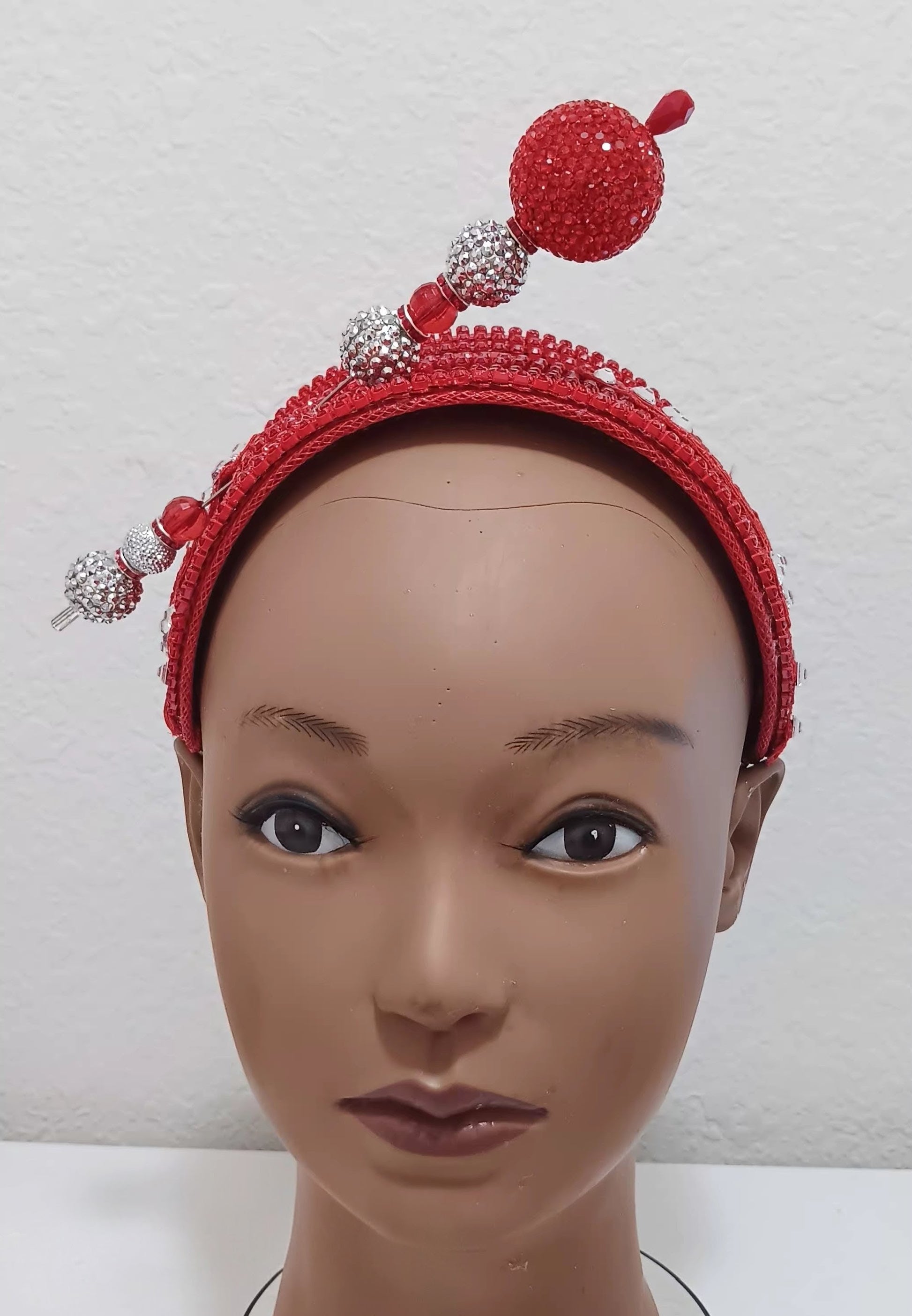 Red hat fascinator headband with hat pin, stylish church hat accessory by Roni Accessories Shop, featuring elegant design and bold color.